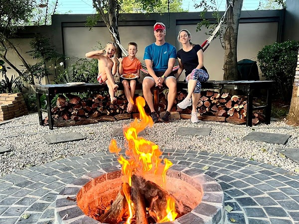 Family enjoying the new fire pit