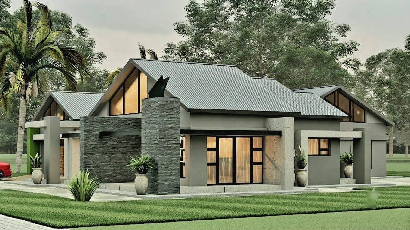 The Stone Gable: charcoal home with stone chimney and covered patio